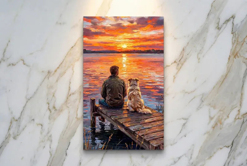 Man and dog watching a painted sunset together